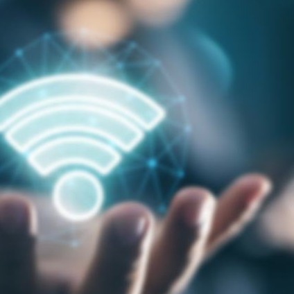 A glowing Wi-Fi symbol above an open hand